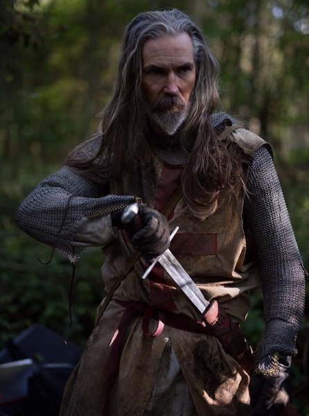 Brother Richard, played by Jon Campling, decked out in Templar costuming. James Bushe & Simon Rowling Interview (Predator: Dark Ages)