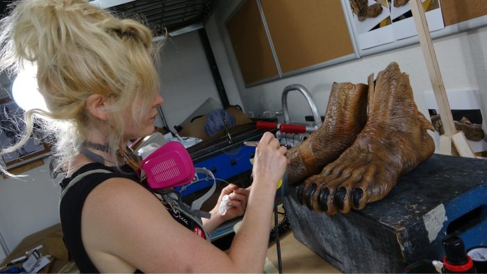 Bonnie Ephraim paints the Feral Predator’s feet.